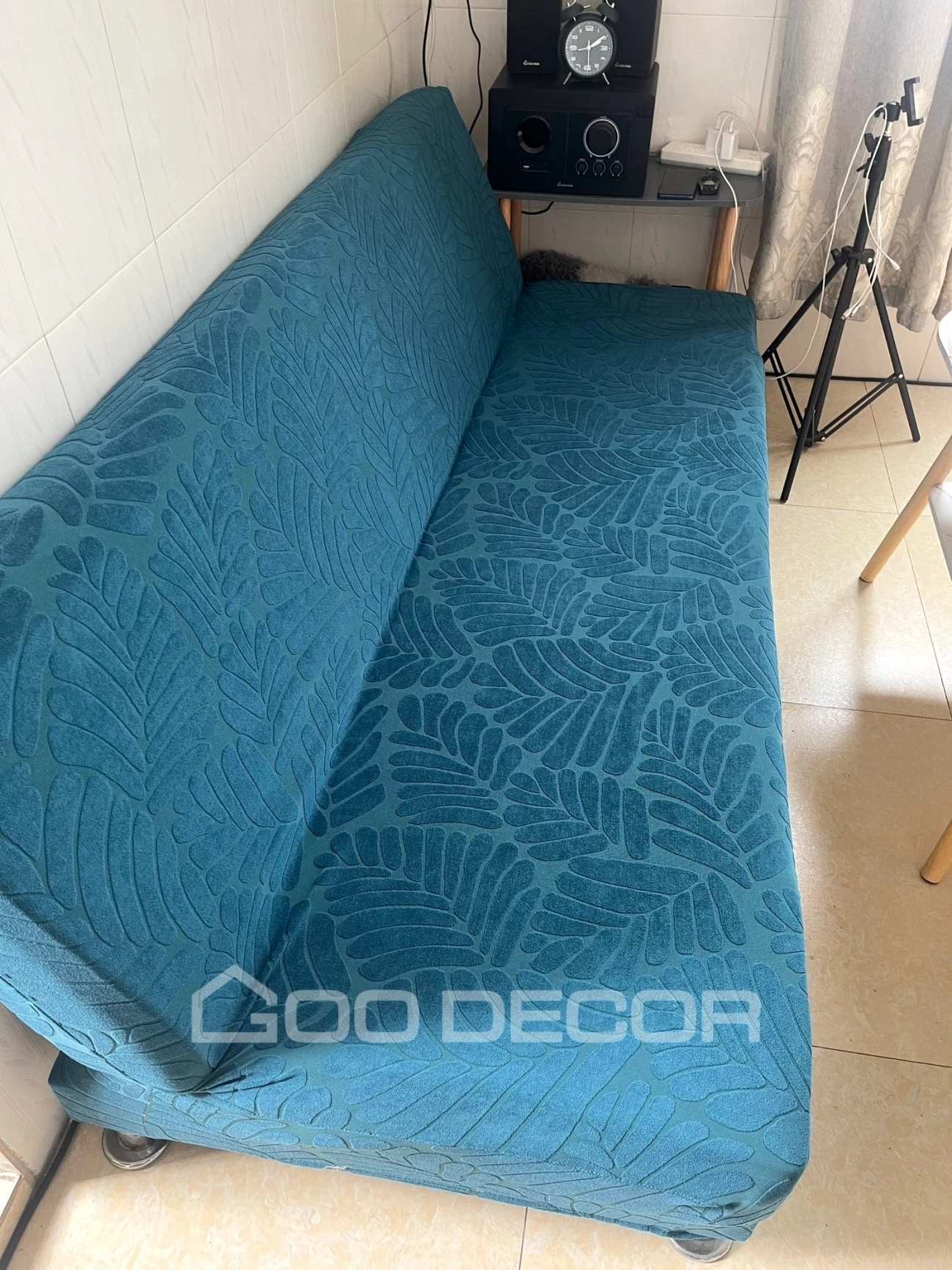 Sofa bed bọc vải nhung họa tiết lá màu xanh cổ vịt