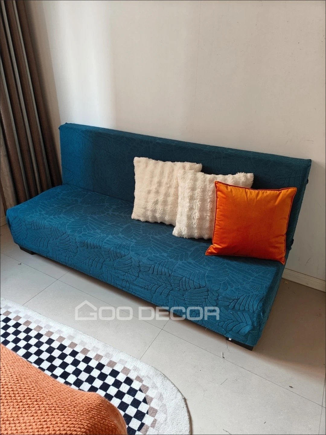 Bọc sofa bed bằng vải nhung họa tiết lá màu xanh cổ vịt