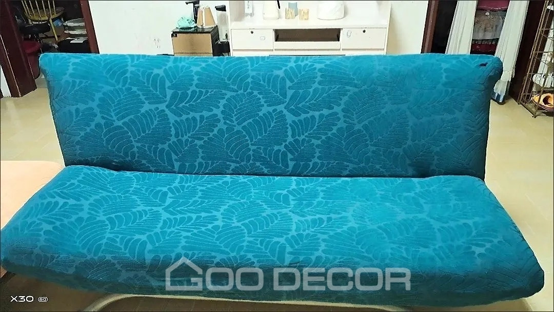 Sofa bed bọc vải nhung họa tiết lá màu xanh cổ vịt